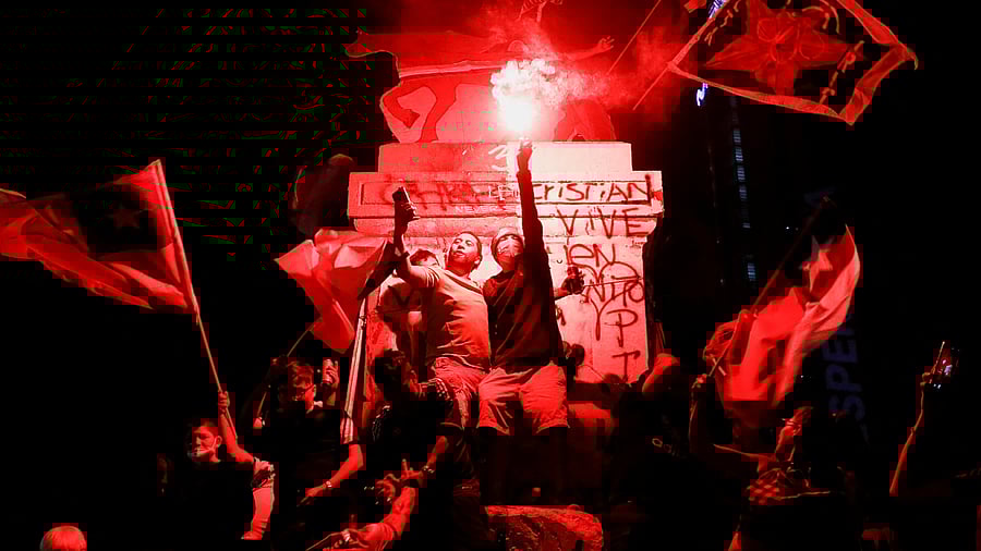  Supporters of Chile's President-elect Gabriel Boric celebrate after their candidate won the presidential election, in Santiago. Credit: Reuters Photo