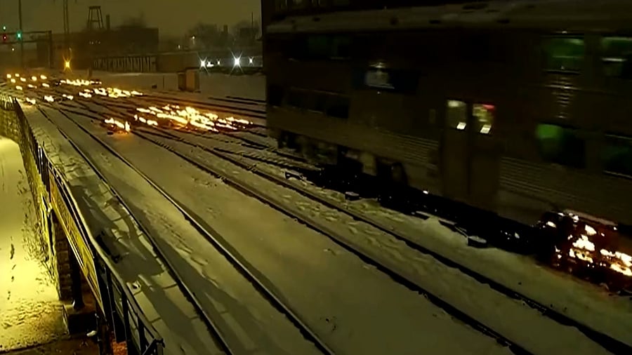 Chicago train tracks put on fire to beat freezing cold; See Pics Credit: Reuters Photo