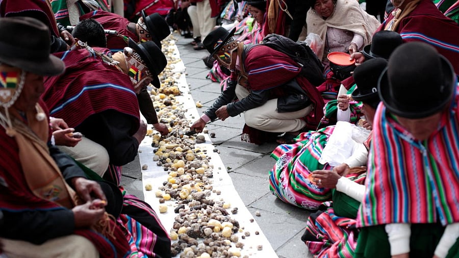 Bolivians from the town of Tiwanacu take part in a ceremony of invitation to the Andean New Year, in La Paz. Credit: Reuters photo