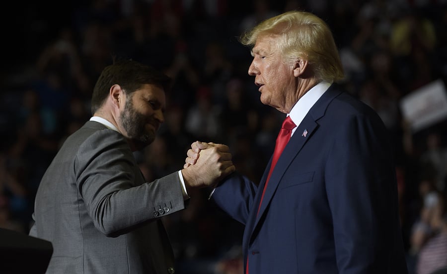 Republican Senate candidate JD Vance and former President Donald Trump speak at a Save America Rally to support Republican candidates running for state and federal offices in the state at the Covelli Centre during on September 17, 2022 in Youngstown. Credit: AFP Photo