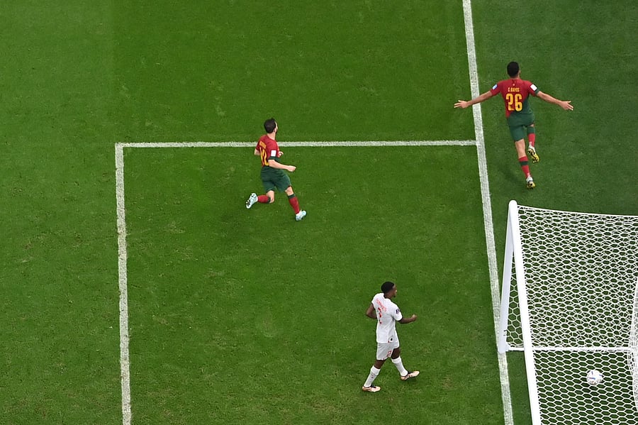 Portugal's forward #26 Goncalo Ramos celebrates after scoring his team's fifth goal during the Qatar 2022 World Cup round of 16 football match between Portugal and Switzerland. Credit: AFP Photo.