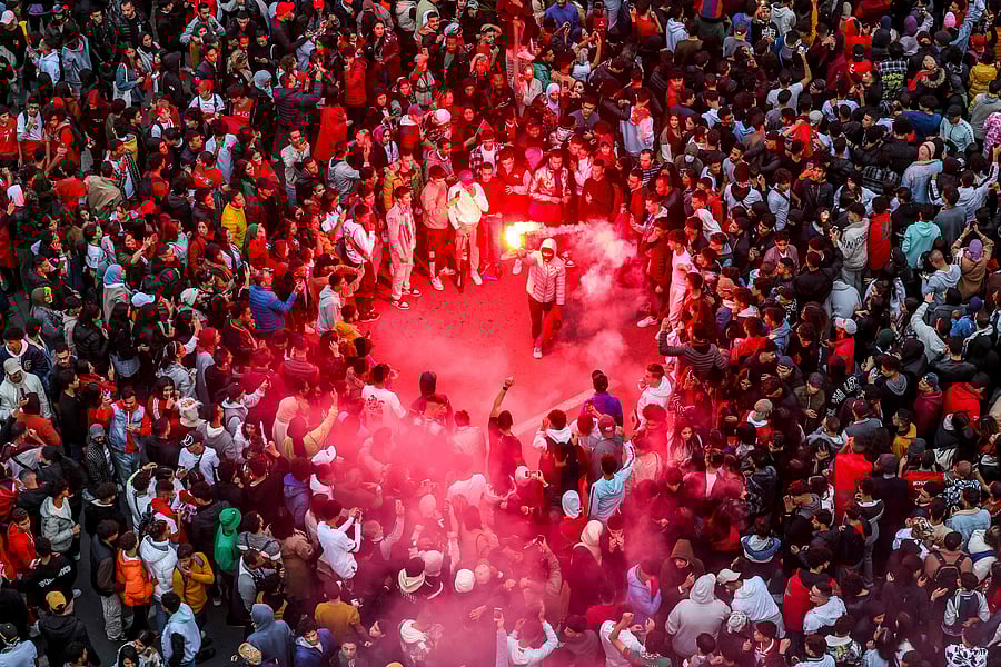 Morocco's supporters celebrate after their country's win of the Qatar 2022 World Cup football match between Morocco and Portugal. Credit: AFP Photo