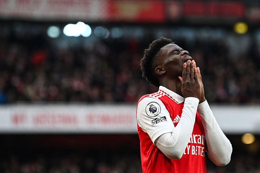 Arsenal's English midfielder Bukayo Saka reacts after missing to score during the English Premier League football match between Arsenal and Bournemouth at the Emirates Stadium in London. Credit: AFP Photo