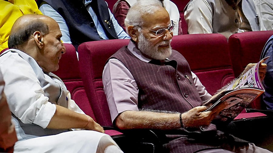 New Delhi: Prime Minister Narendra Modi interacts with Defence Minister Rajnath Singh during the BJP parliamentary party meeting, in New Delhi, Tuesday, July 25, 2023. (PTI Photo