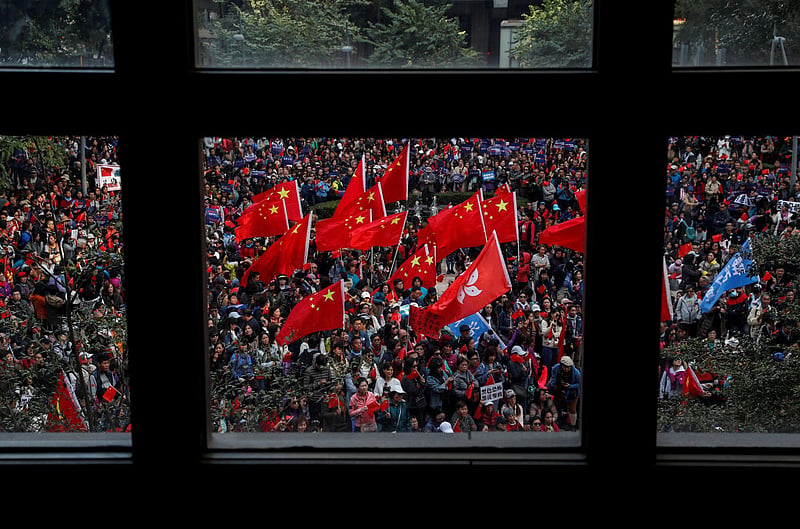 Hong Kongers mark half-year protest anniv with rally