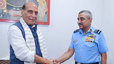 Alt="Defence Minister Rajnath Singh with  Air Marshal Ashutosh Dixit"