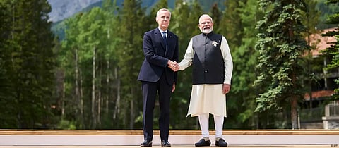 

Forget and forgive: Carney, Modi seal nuclear pact; target $50 billion trade