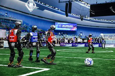 Robots run, kick and fight as Beijing hosts world’s first humanoid games