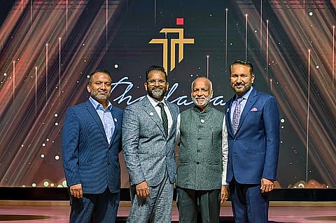 Kunhu Mohamed (third from left)