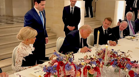 Trump signing the deal