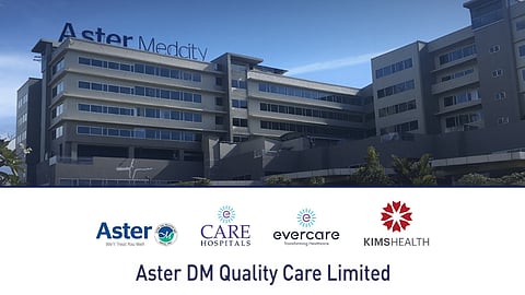 Photo of Aster Med City Kochi, along with Aster DM Quality Care branding featuring Aster, CARE Hospitals, Evercare and KIMSHEALTH