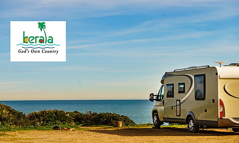 caravan parked in a river shore