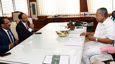 federal bank md kvs maniyan and kerala cm pinarayi vijayan