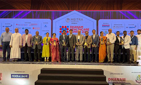 dhanam healthcare awardees on stage