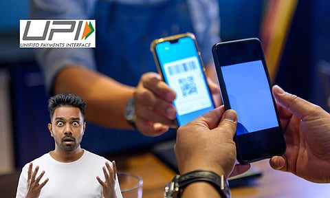 man in shock, mobile transaction , upi logo