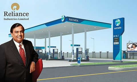 Nayara Petrol pumb, mukesh ambani pic and reliance industries logo