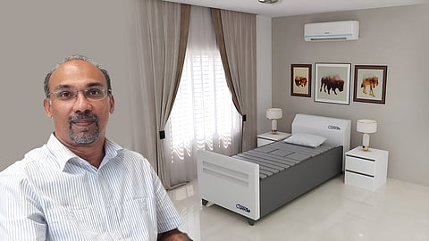 Dileepkumar and entrepreneur from Alappuzha, with the product he developed, named Caredil