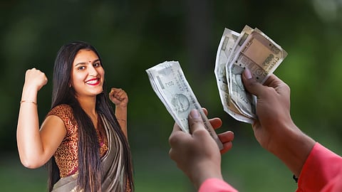 happy indian lady with money