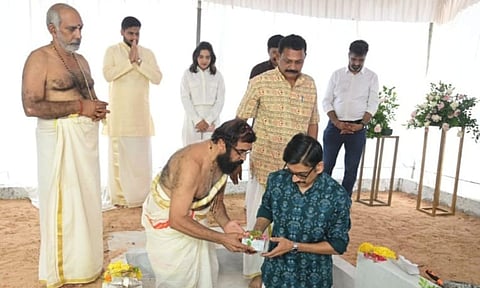 Aditya Varma, a member of the Travancore royal family, lays the foundation stone for 'Elite Anantha', the ultra-luxury housing project by Elite Developers. Arjun Rajeevan (Director & CEO, Elite Developers), Goshala Vishnu Vasudevan Namboothiri, and Dhanesa Raghulal (Director, Elite Foods and Innovations Group) are also present