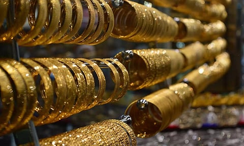 gold bangles in shop