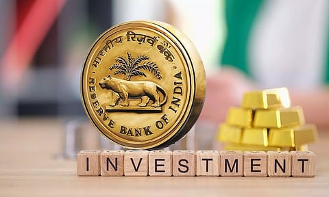 RBI logo and gold bars