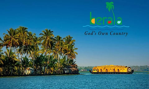 backwaters of kerala with a house boat and kerala gods own country logo