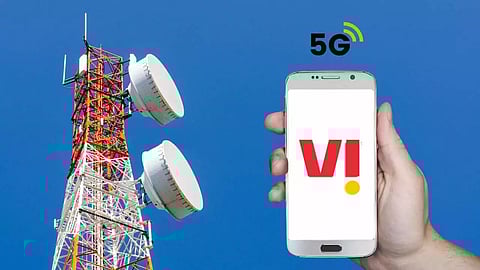 Vodafone idea logo, mobile phone in hand