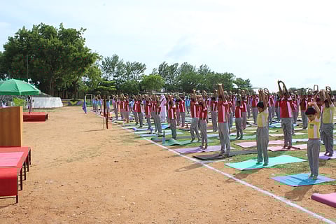 DPS Mysore celebrates Yoga Day with community spirit