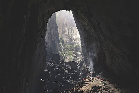 How can a cave in Vietnam hide its own clouds?