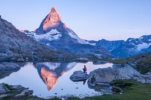 How can snow turn pink in the Alps?