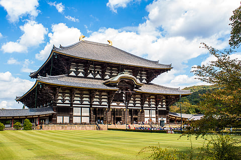Why do temples in Japan ring with sound even when no bell moves?