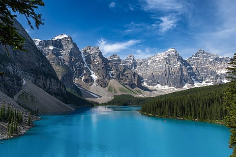 How can a river in Canada glow milky turquoise when glaciers move?