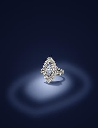 A fancy coloured diamond and diamond ring by Boodles