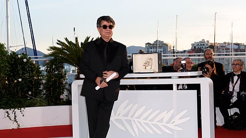 O cineasta iraniano Jafar Panahi distinguido com a Palma de Ouro.