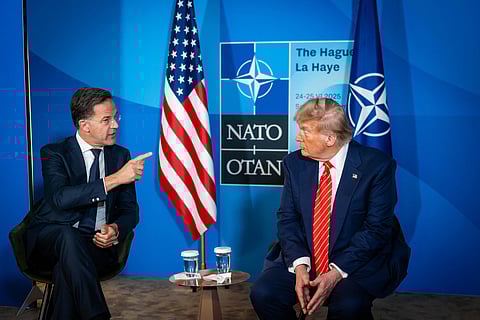 O secretário-geral da NATO, Mark Rutte, com o presidente dos EUA, Donald Trump, esta quarta-feira de manhã em Haia.