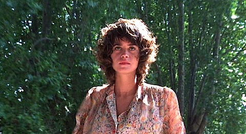 Maria Schneider filmada por Antonioni em Profissão: Repórter (1975).