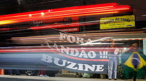 "Fora Xandão!!", lê-se num cartaz de uma manifestação pró-Bolsonaro, recorrendo à alcunha de Moraes.