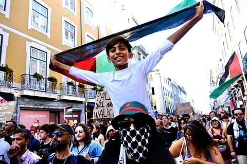 Fotogaleria: manifestação pela libertação dos portugueses da flotilha junta multidão em Lisboa  