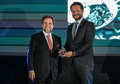 Otácílio (esq) em um dos eventos promovidos pela câmara.