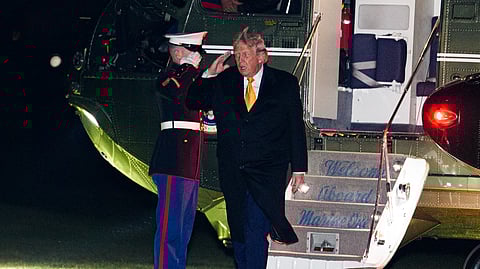 Donald Trump no regresso a Washington, após ter passado as festas em Mar-a-Lago.