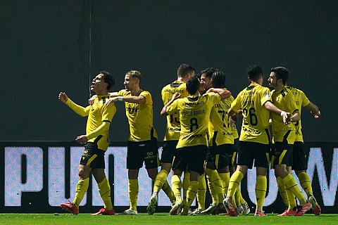 Jogadores do Fafe festejam.