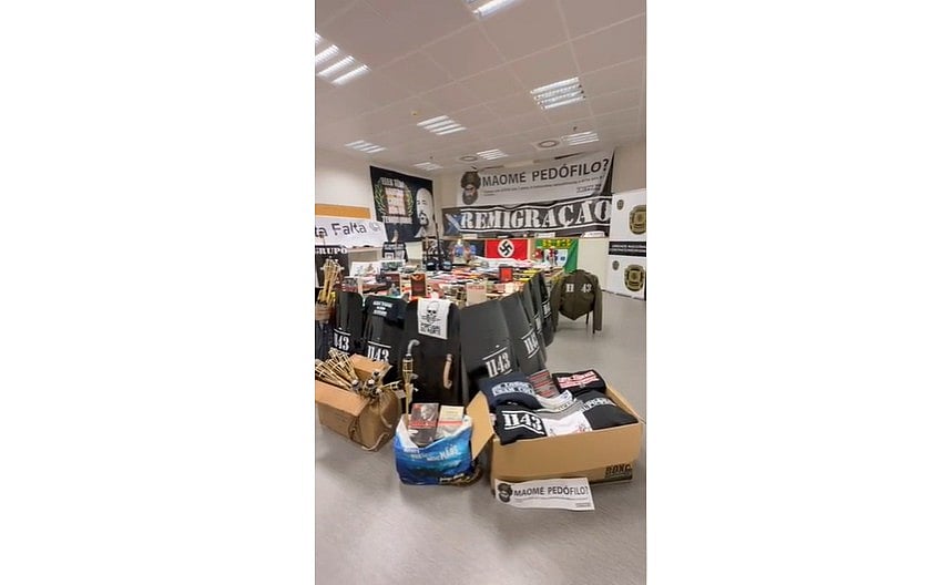 Weapons, riot shields and large amounts of propaganda material. Video shows what was seized from group 1143