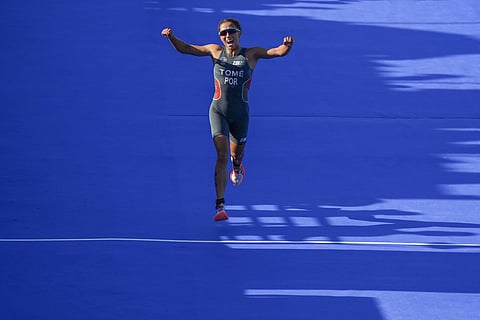 A felicidade de Maria Tomé no momento de cortar a meta em quinto lugar.