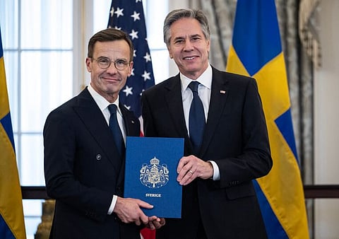 Secretário de Estado dos EUA, Antony Blinken, recebe os documentos de adesaão à NATO do primeiro-ministro sueco Ulf Kristersson