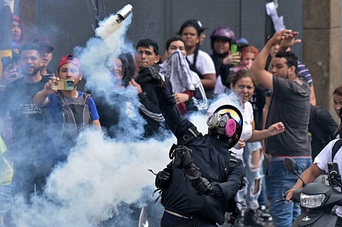 Manifestantes em Caracas foram recebidos em força pela Polícia Militarizada.