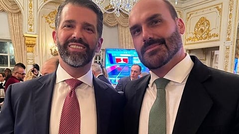 Eduardo Bolsonaro (à direita na foto) com Donald Trump Jr.