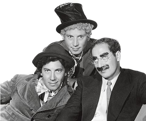 Os três mais famosos irmãos Marx, figuras ímpares do cinema americano.