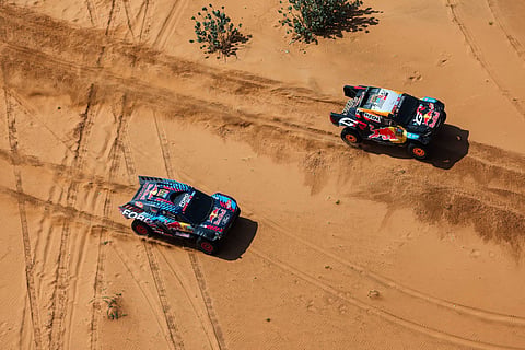 Lucas Moraes and Armand Monleon on their Toyota GR DKR Hilux of the Toyota Gazoo Racing followed by Mitch Guthrie and Kellon Walch on their Ford Raptor of the Ford M-Sport Team during the Stage 8 of the Dakar 2025 on January 12, 2025 between Al Duwadimi and Riyadh, Saudi Arabia // DPPI / Red Bull Content Pool // SI202501131218 // Usage for editorial use only //