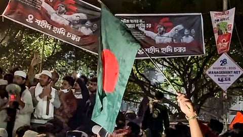  People stage a protest over the death of Sharif Osman Hadi, one of the key leaders in the Bangladesh student uprising, in Dhaka, Bangladesh