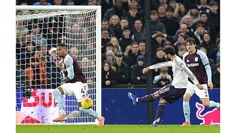 Manchester United’s Bruno Fernandes, second right, attempts a shot towards goal during the Premier League soccer match between Aston Villa and Manchester United, in Birmingham, England (Photo: AP)